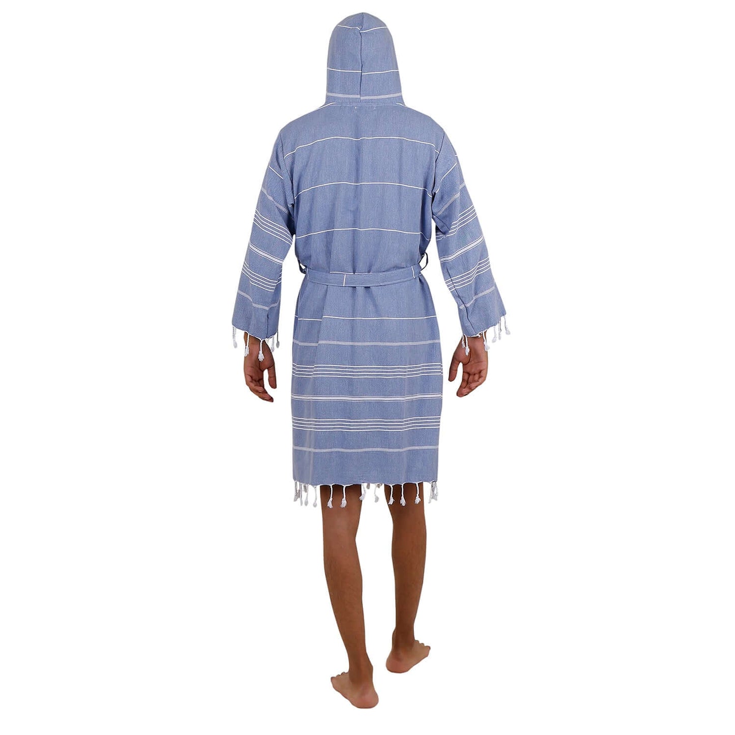 Rear view of the man wearing Loom Legacy xsmall/small blue bathrobe showcasing the hood, white stripe pattern, and fringe detailing at the bottom.
