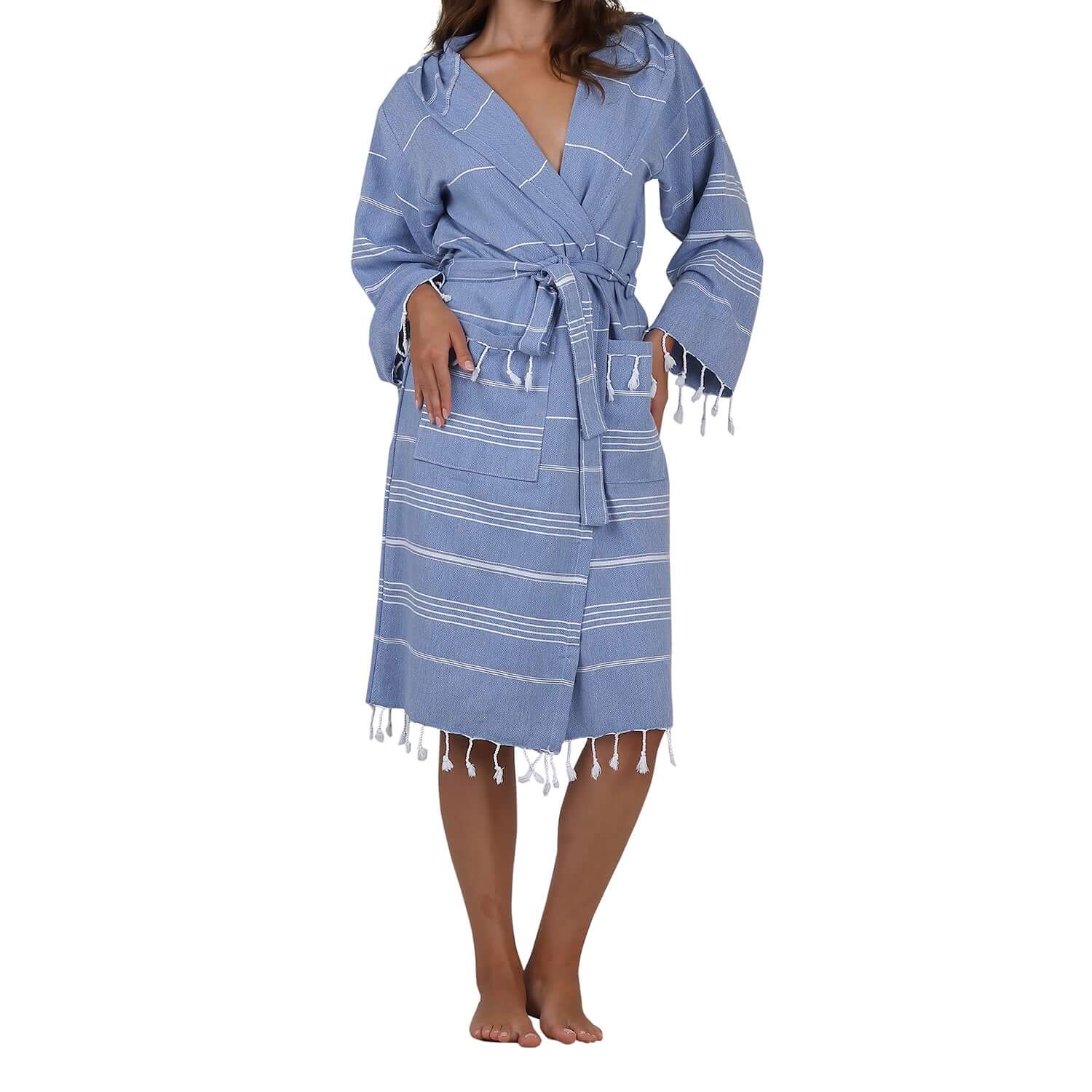  Woman wearing Loom Legacy xsmall/small blue bathrobe with white stripes and fringe detailing at the bottom.